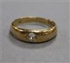 An Edwardian 18ct gold and gypsy set diamond ring, size U.                                                                             