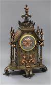 A late 19th century French wrought iron and copper mounted eight mantel clock height 47.5cm                                            