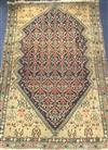 A Caucasian red, blue and cream ground rug 190 x 130cm.                                                                                