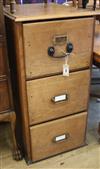 An oak three drawer filing chest W.49cm                                                                                                