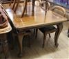 A 1920's mahogany extending dining table W.180cm extended                                                                              