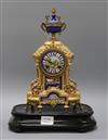 A late 19th century French gilt spelter and Sevres style porcelain eight day mantel clock, height 34cm excluding stand                 