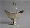 A George III silver panelled boat shaped pedestal sugar basket, London, 1787, length 15.6cm.                                           