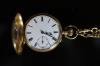 A late 19th/early 20th century 18K gold half hunter keyless pocket watch, by William Greenwood of Leeds, together with an 18ct gold curblink albert                                                                         