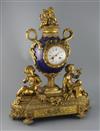 Vernet, Rue du Bac 42. A 19th century French ormolu and bleu du roi porcelain mantel clock, width 19in. depth 7.5in. height 23in.      