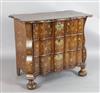 An early 19th century Dutch walnut and marquetry serpentine chest, W.3ft D.1ft 9in. H.2ft 7in.                                         