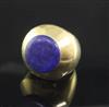 A heavy high carat gold and lapis lazuli set ring, size M.                                                                             