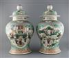 A pair of Chinese famille rose jars and covers, late 19th century, H. 45.5cm                                                           