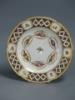 A Derby plate painted with central bird and leafy chains, c.1800, diameter 26.5cm                                                                                                                                           