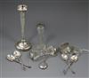 Two silver napkin rings, a silver vase, silver mounted vase, four silver spoons, silver locket and a glass knife rest.                 