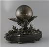 A late 19th century French bronze mantel clock modelled as a globe supported by an eagle, width 14in. height 13in.                     