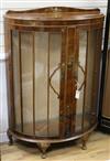 A lacquered bow-fronted display cabinet W.90cm                                                                                         