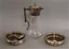 A silver plate mounted claret jug, a pair of silver plated wine coasters and a plated sauce ladle.                                     