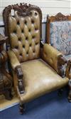 A pair of mid 19th century tan leather armchairs                                                                                       