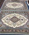 Two Persian style ivory ground rugs 220 x 154cm                                                                                        