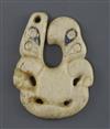 A rare Maori whale bone and paua shell pendant, hei tiki of unusual hei matau form, possibly late 18th/early 19th century, H. 8.8cm, sh