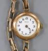 A lady's early 20th century 9ct gold Rolex manual wind wrist watch, on a 9ct flexible bracelet (no glass)                                                                                                                   