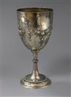 A Victorian embossed silver goblet, Arthur Sibley, London, 1873, 6.5 oz.                                                               