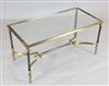 Attributed to Maison Jansen. A gilt and ebonised bronze coffee table, W.2ft 11.5in. D.1ft 5.5in. H.1ft 5.5in.                          