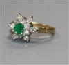 An 18ct gold, emerald and diamond flower head ring, size N.                                                                            