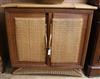 A teak and rattan side cabinet W.105cm                                                                                                 