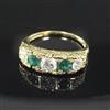 A modern Victorian style 18ct gold, emerald and diamond five stone half hoop ring, size N.                                             