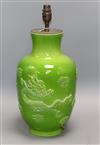 A Chinese green crackle glaze 'dragon' vase converted to a lamp.                                                                       