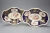 A pair of Crown Derby oval dishes, painted with four floral panels, c.1825, length 31cm                                                                                                                                     