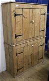 A pine cupboard W.102cm.                                                                                                               