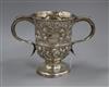 A George III later embossed silver two handled cup (a.f), William & James Priest, London, 1765 15 oz.                                  