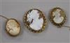 Three assorted mounted cameo brooches including 9ct gold, largest 44mm.                                                                