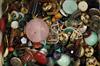 A large quantity of assorted buttons, hardstone and loose cut gemstones.                                                               