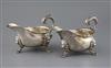 A pair of George V 18th century style silver sauceboats by Thomas of New Bond Street, 28 oz.                                           