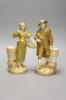 A pair of Royal Worcester blush figures of Spanish grape pickers c.1918, height 25.5cm                                                                                                                                      