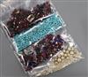 Four jewellery bags containing assorted unmounted and cut gemstones.                                                                   