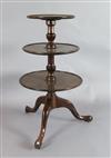 A George II mahogany three tier dumb waiter, H.3ft 6in. Diam. 1ft 11in.                                                                