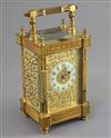 An early 20th century French ormolu hour repeating carriage clock, 6.5in., with red leather travelling case                            