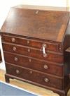 A George III oak bureau, with later handles W.94cm                                                                                     