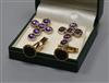 A pair of 9ct gold and black onyx cufflinks and a pair of silver and amethyst cross ear studs.                                         