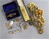 A group of assorted jewellery including a 9ct gold bar brooch, stick pin etc.                                                          