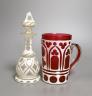 A Bohemian cranberry overlay mug and similar white overlay scent bottle, Scent bottle 17 cms high.                                                                                                                          
