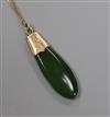 A yellow metal mounted jade pendant, on a 9ct gold fine link chain, pendant 42mm.                                                      