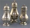 A suite of three early George II Scottish silver baluster pepperettes by James Mitchelson I, gross weight 21 oz.                       