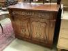 A tailor's bespoke carved mahogany shop cabinet, fitted two panelled doors, inscribed to the front in gilt lettering                                                                                                        