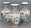 A pair of Chinese famille rose vases and another similar (3) Height 36cm                                                               