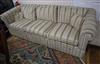 A three seater Chesterfield settee upholstered in striped fabric W.226cm                                                               