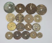 China, 17 bronze or copper charms or amulets, Qing dynasty or earlier,                                                                 