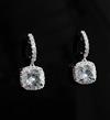 A pair of modern 18ct white gold, aquamarine and diamond set drop earrings, 22mm.                                                      