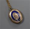 An early 20th century yellow metal and enamel oval locket with glazed back, on a later 9ct gold chain, locket 20mm.                    