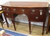 A George III style bowfront sideboard W.138cm.                                                                                         